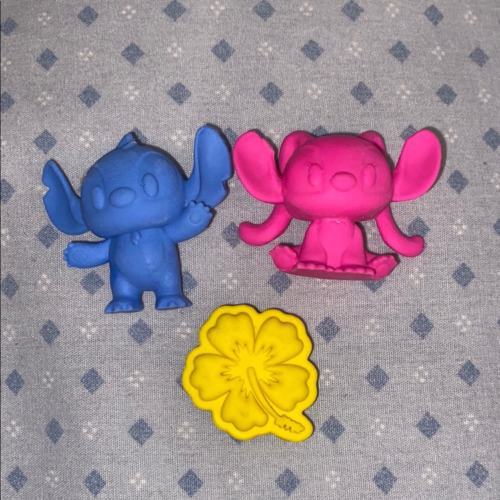 Disney blue and pink stitch and yellow flower erasers